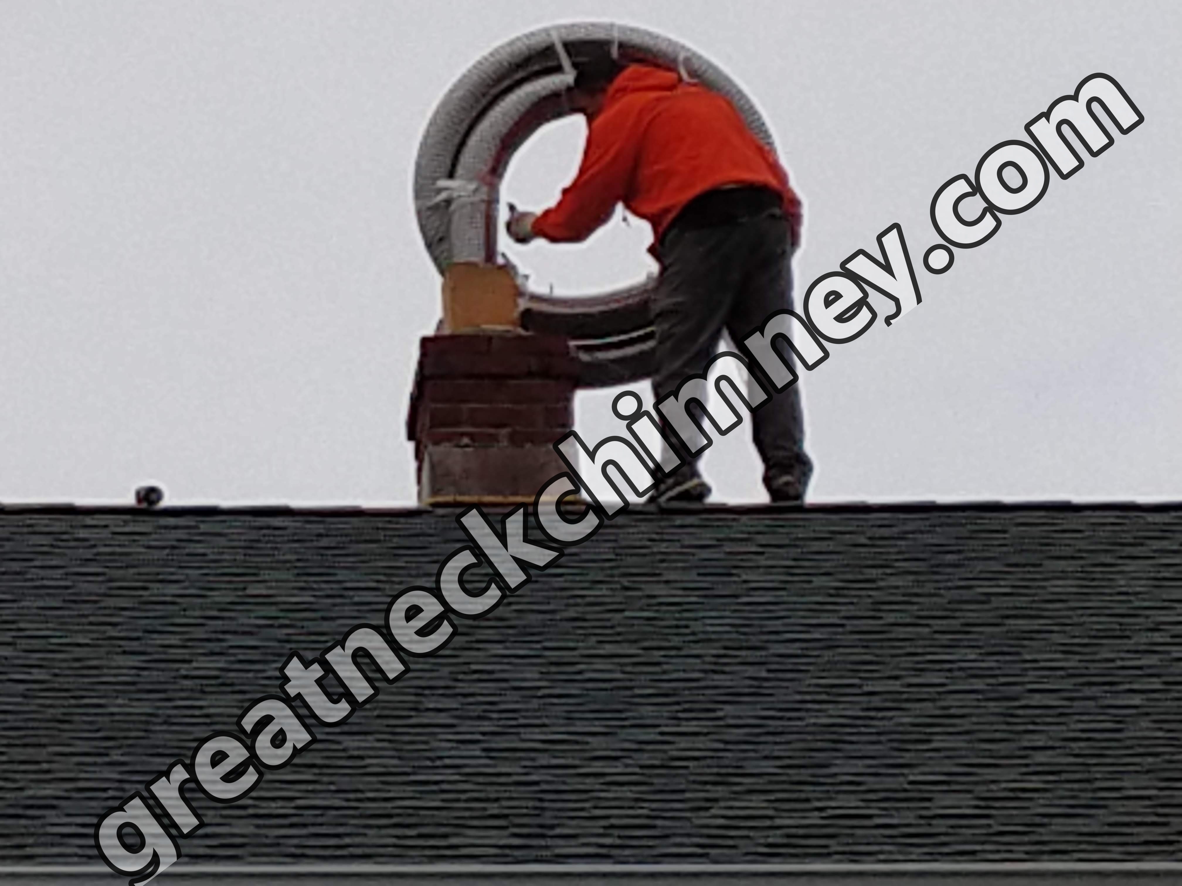 Flexible stainless chimney liner being installed in Great Neck, New York